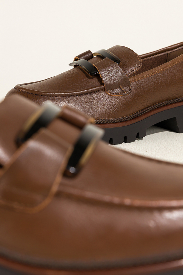 Brązowe mokasyny skórzane damskie Sergio Leone na bieżnikowanej podeszwie czarna ozdoba na cholewce NP74833-H